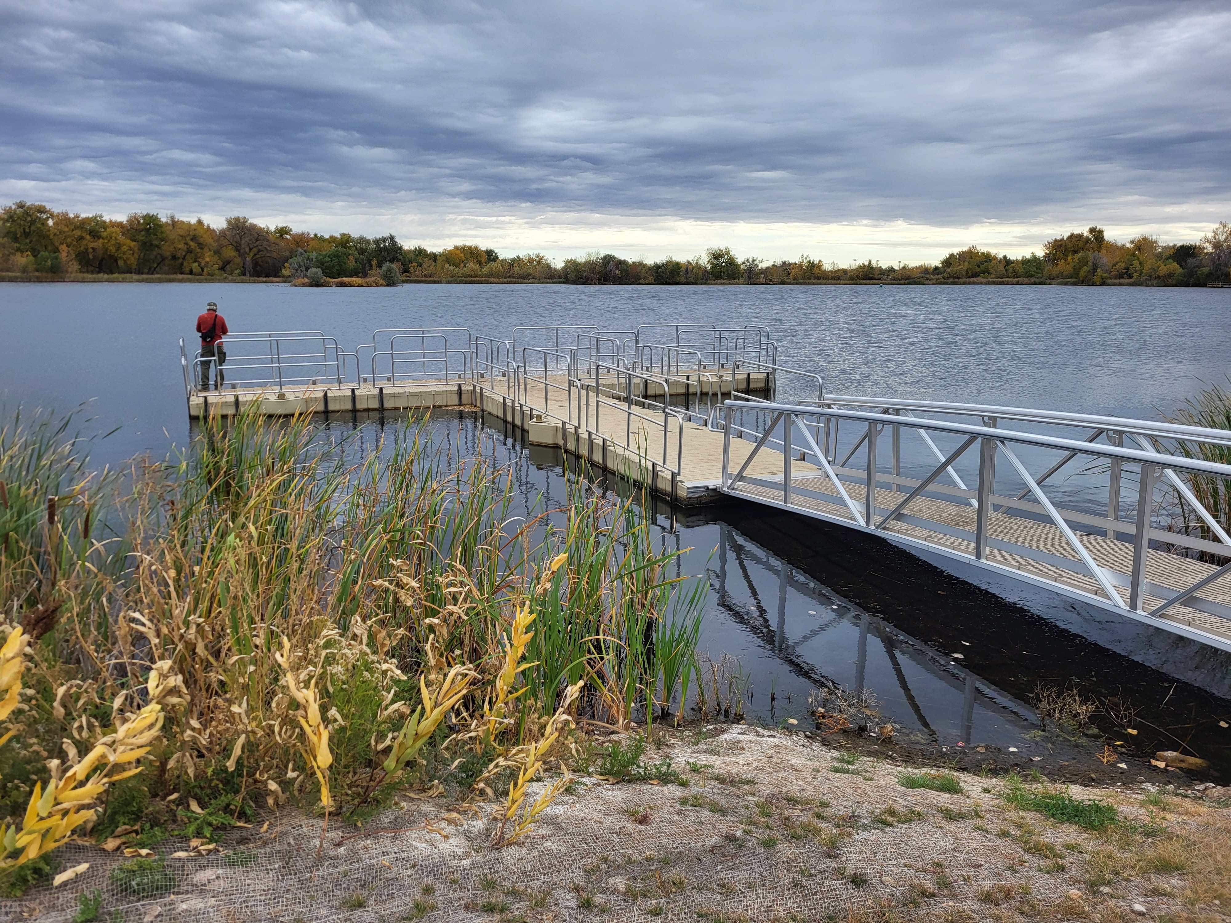 Accessible floating fishing docks and gangway at River's Edge Natural Area in Loveland